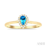 5x3 MM Pear Shape Blue Topaz and 1/20 Ctw Single Cut Diamond Halo Semi-Precious Ring in 14K Yellow Gold