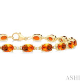 6X4 MM Oval Cut Citrine and 1/6 Ctw Round Cut Diamond Semi-Precious Tennis Bracelet in 10K Yellow Gold