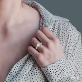1/2 Ctw Pear Shape Center Criss Cross Carved Shank Lovebright Round Cut Diamond Engagement Ring in 14K Yellow and White gold