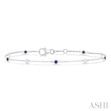 1.8 MM Sapphire and 1/10 Ctw Bezel Set Round Cut Diamond Precious Gemstone Station Bracelet in 14K White Gold