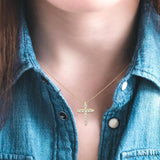 1/20 Ctw Round Cut Diamond Cross Petite Pendant in 10K Yellow Gold with Chain