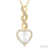 7 MM Round Shape Cultured Pearl and 1/4 Ctw Heart Frame Round Cut Diamond Fashion Pendant With Chain in 10K Yellow Gold