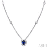 6X4MM Oval Cut Sapphire and 1/6 Ctw Round Cut Diamond Necklace in 14K White Gold